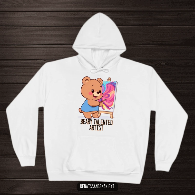 Funny hoodie featuring a smiling bear painting a colorful, abstract masterpiece, ideal for cozy artistic expression.