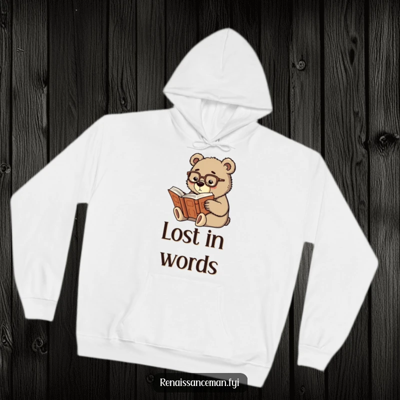Funny scholarly bear wearing glasses, engrossed in a large, ancient book, featured on a comfortable hoodie.