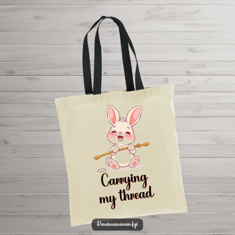 Funny tote bag showing a cheerful bunny character beaming while threading a large needle with great concentration and joy.